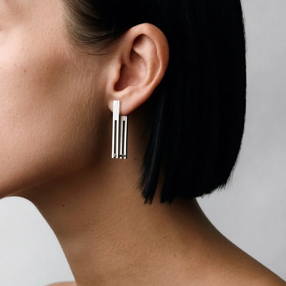 CONCORD⁵ - Modular earrings with a hinge.