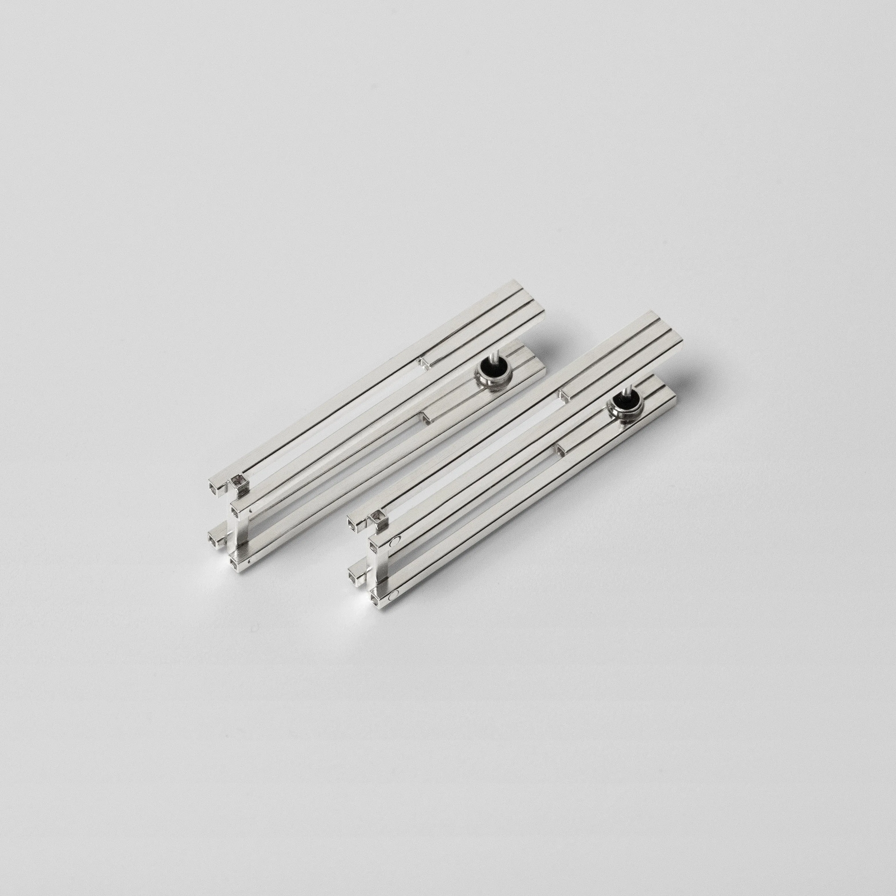 CONCORD⁵ - Modular earrings with a hinge.