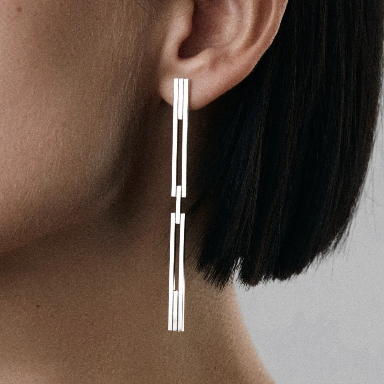 CONCORD⁵ - Modular earrings with a hinge.