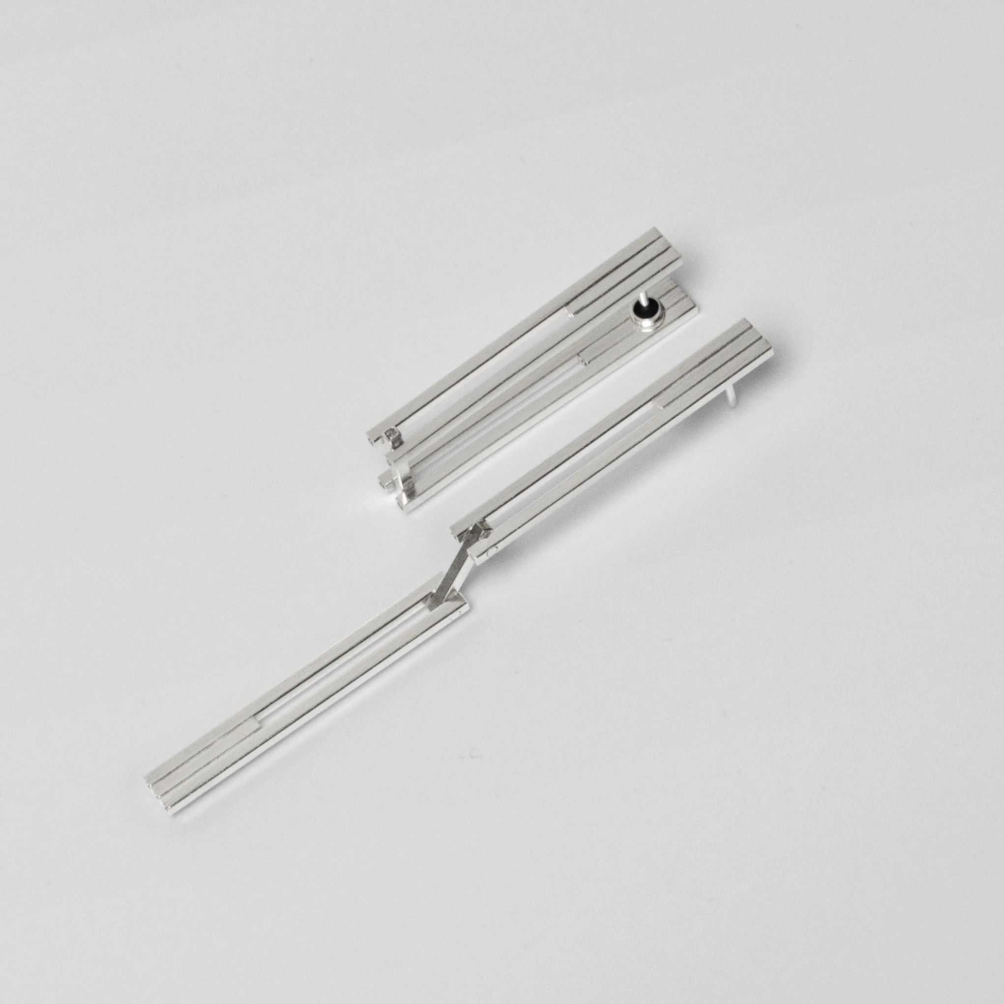 CONCORD⁵ - Modular earrings with a hinge.