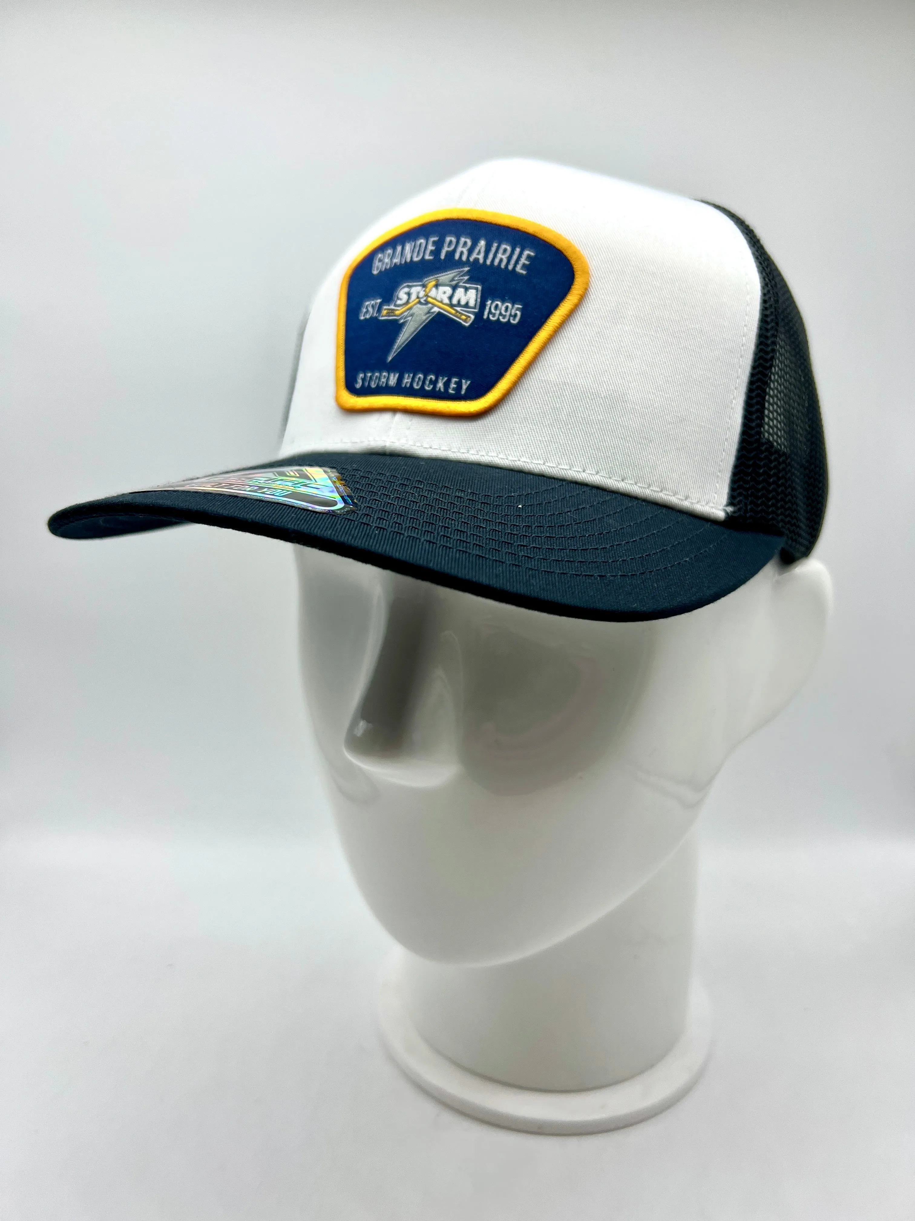 Storm Woven Patch Tucker Cap